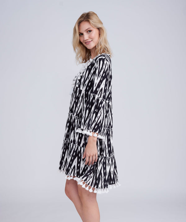 Side View: Monochrome V-Neck Midi Dress with Graphic Print