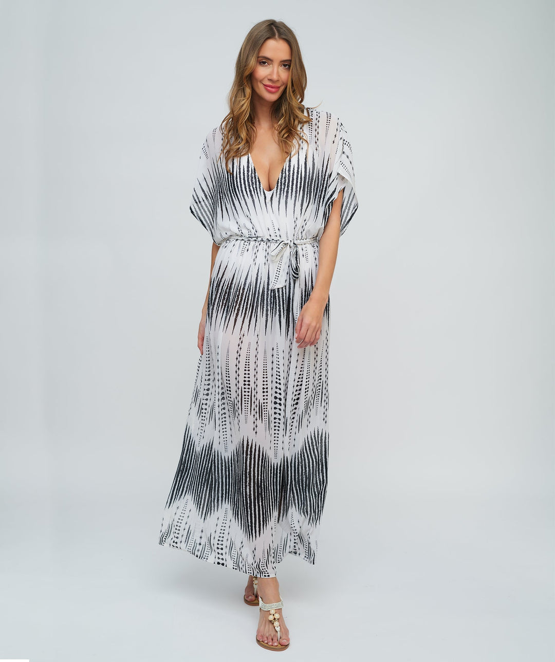 Black and White Animal Print Maxi Dress with Deep V-Neckline and Drawstring Waist